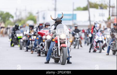 Valle Hermoso, Tamaulipas, Mexico - March 18, 2023: City Anniversary Parade, Members of the Bikehermoso motorcycle club displaying their bikes at the Stock Photo