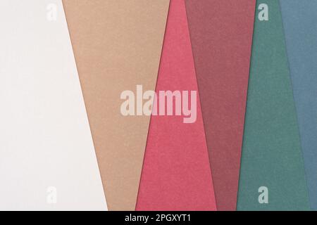 scrapbook paper background featuring layered sheets in various colours Stock Photo