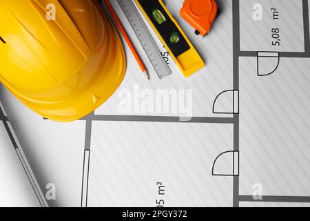 Construction drawing and different tools, above view Stock Photo