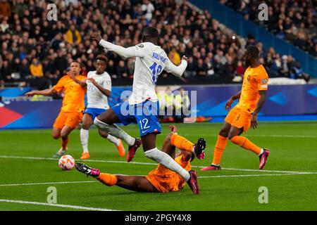 Paris, France. 24th Mar, 2023. France's Randal Kolo Muani (Up) breaks through during the UEFA Euro 2024 qualification match between France and the Netherlands in Paris, France, March 24, 2023. Credit: Glenn Gervot/Xinhua/Alamy Live News Stock Photo