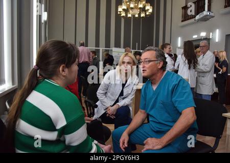 Lviv, Ukraine. 20th Mar, 2023. An American surgeon consults a Ukrainian child in one of Lviv's hospitals. Credit: SOPA Images Limited/Alamy Live News Stock Photo
