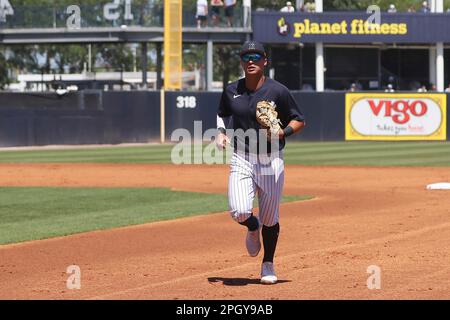 TAMPA, FL - MARCH 16: New York Yankees Outfielder Aaron Judge (99) trots to  first base during the spring training game between the Pittsburgh Pirates  and the New York Yankees on March