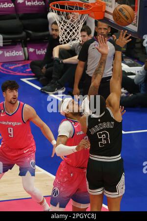 San Antonio Spurs forward Keldon Johnson (0) shoots over Minnesota ...