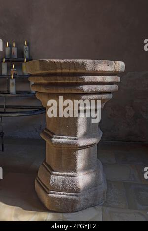 Historic baptismal font from the 16th century, in the St.Egidienkirche, Beerbach, Middle Franconia, Bavaria, Germany Stock Photo