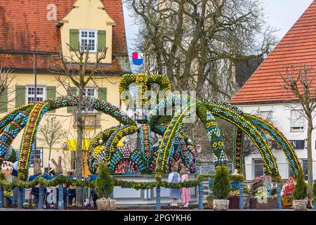 Easter fountain, 11000 hand-painted eggs decorate the village fountain at Easter in Schechingen, Ostalbkreis, Baden-Wuerttemberg, Germany Stock Photo