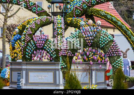 Easter fountain, 11000 hand-painted eggs decorate the village fountain at Easter in Schechingen, Ostalbkreis, Baden-Wuerttemberg, Germany Stock Photo