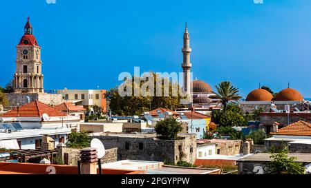 View of Clock Tower and Sueleyman Pasha Mosque, Roloi, 7th c., Rhodes Town, Greece Stock Photo