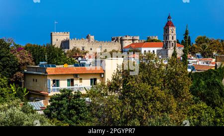 View of Clock Tower and Grand Masters Palace, Roloi, 7th c., Rhodes Town, Greece Stock Photo