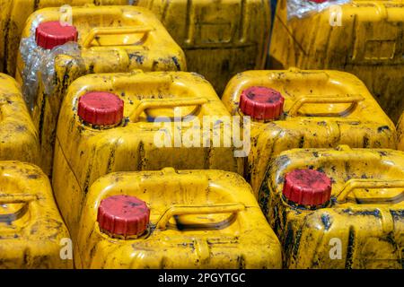 Stock of dirty plastic jerry cans Stock Photo