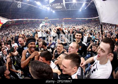 Belgrade. 24th Mar, 2023. Partizan's team players and their supporters celebrate victory against Olympiacos after their regular season round 30 Euroleague basketball match in Belgrade, Serbia on March 24, 2023. Credit: Predrag Milosavljevic/Xinhua/Alamy Live News Stock Photo