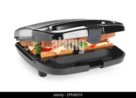 Modern grill maker with tasty sandwiches on white background Stock Photo