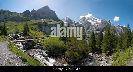 The Doldenhorn and Frundenhorn over the Oeschinensee lake. Stock Photo