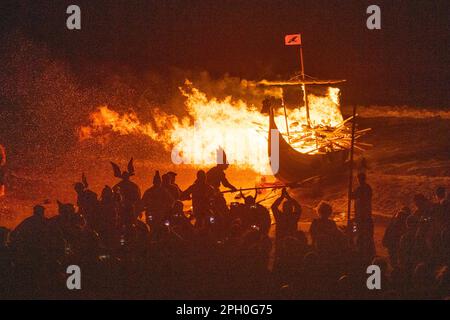 Bigton, Shetland, UK, 24th March 2023, South Mainland Up Helly Aa the final fire festival of the year led by Guizer Jarl Jamie Laurenson set off through the village of Bigton to set light to his galley on St Ninians Isle after a wait of over 3 years due to COVID. Photo: Dave Donaldson/Alamy Live News Stock Photo