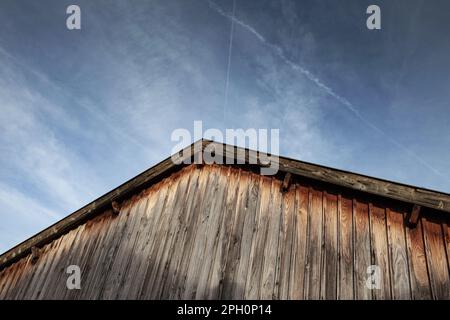 Wooden warehouse and blue sky in the background Stock Photo