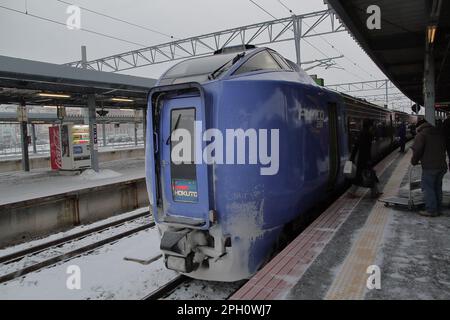 A Super Hokuto train (Series 281) stopped by the Hakodate Staion on the JR Hokkaido Hakodate Main Line in frozen winter. Stock Photo