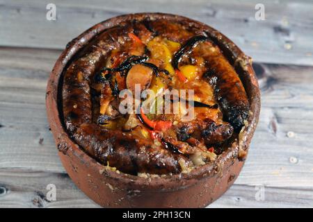 Traditional Egyptian mixture of lamb meat, sausage mumbar intestines filled with rice, kawareh trotters cow feet, pieces of cooked kidneys, hearts and Stock Photo