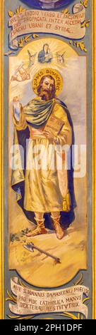 VALENCIA, SPAIN - FEBRUAR 17, 2022: The freco of St. John Damascene in the Temple in the church Iglesia del Temple by Vicente Pastor (1923). Stock Photo