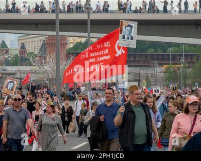 MOSCOW, RUSSIA , May 09, 2019: Over one million people of all ages take part in the Immortal Regiment parade celebrating the memory of loved ones fall Stock Photo