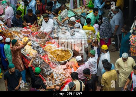 Bangladeshi vendors sell Iftar's items at chawkbazar in the capital Dhaka, Bangladesh on the first day of the Muslim fasting month Holly Ramadan Stock Photo