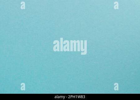 Light blue colored tinted paper sheet background. Stock Photo
