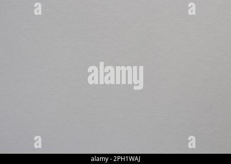 Medium gray colored tinted paper sheet background. Stock Photo