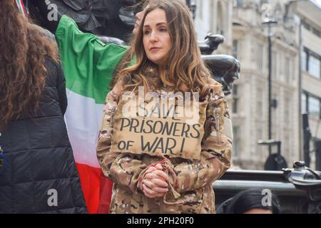 London, UK. 25th March 2023. Iranian and Ukrainian women organised a joint protest in Piccadilly Circus, calling for freedom in Iran and an end to Russian attacks in Ukraine. Credit: Vuk Valcic/Alamy Live News Stock Photo
