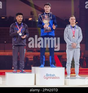 Exhibition Centre, Liverpool, UK. 25th Mar, 2023. British Gymnastics Championships Day 3; Men's Individual All-Around Final gold medallist - Adam Tobin (Falcons Gym Academy) (centre), silver medallist - Jake Jarman (Huntingdon Olympic) (left), bronze medallist - Pavel Karnejenko (South Essex GC) (right) Credit: Action Plus Sports/Alamy Live News Stock Photo