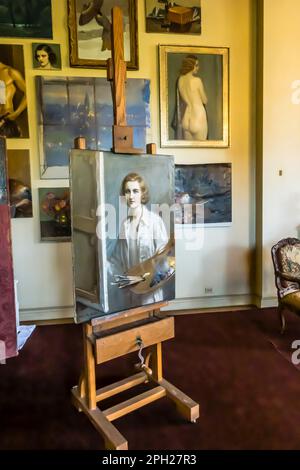 Huguette Clark's art studio with a self portrait of Huguette inside Bellosguardo, the Clark Mansion, in Santa Barbara. Stock Photo