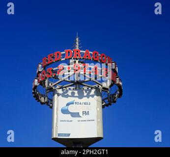 Cardiff Bay-Red Dragon Radio sign against blue sky  Taken March 2023 Stock Photo