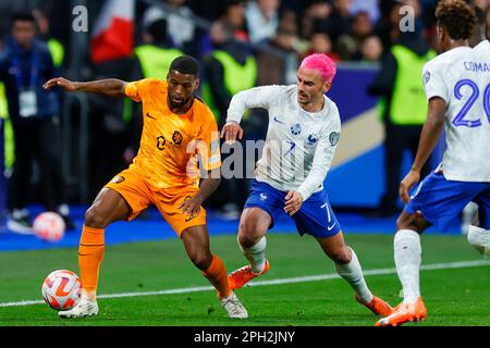 24-03-2023: Sport: Frankrijk vs Nederland  PARIS, NETHERLANDS - MARCH 24: Georginio Wijnaldum (Netherlands) and Antoine Griezmann (France) during the Stock Photo