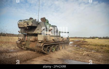 Polish soldiers maneuver an AHS Krab, a self-propelled tracked gun ...