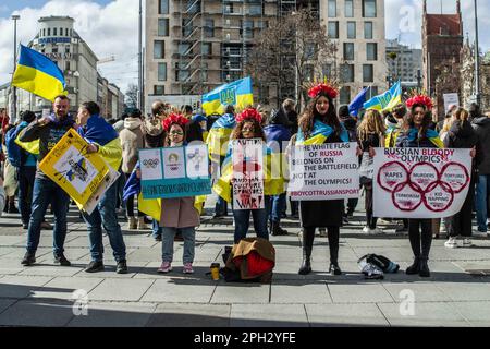 Munich, Bavaria, Germany. 25th Mar, 2023. The Ukrainian community and German supporters of Ukraine's defense demonstrated at Munich's Stachus against the Olympics allowing Russian athletes to compete despite their invasion of Ukraine. Critics maintain this will be a valuable propaganda and PR win for Russia. (Credit Image: © Sachelle Babbar/ZUMA Press Wire) EDITORIAL USAGE ONLY! Not for Commercial USAGE! Credit: ZUMA Press, Inc./Alamy Live News Stock Photo
