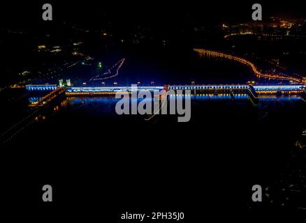 YICHANG, CHINA - MARCH 25, 2023 - Aerial photo shows the night view of the Gezhou Dam of the Three Gorges of the Yangtze River in Yichang, Hubei provi Stock Photo