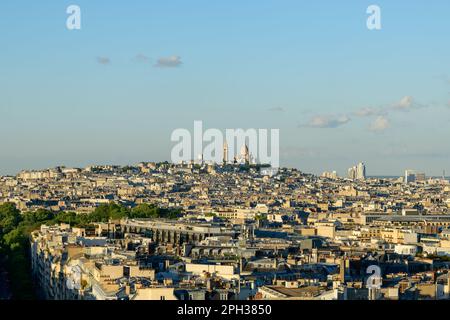 This landscape photo was taken, in Europe, in France, in ile de France, in Paris, in summer. We see the Basilica of the Sacred Heart on the Montmartre Stock Photo