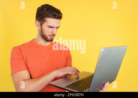 Caucasian man having a problem with a laptop Stock Photo