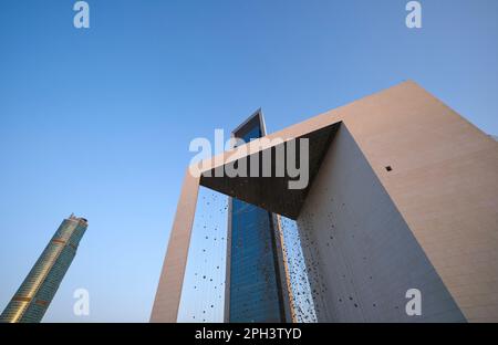 View of the Founder's Memorial, monument, dedicated to Sheikh Zayed bin Sultan. The ADNOC headquarters tower in the background. In Abu Dhabi, UAE, Uni Stock Photo