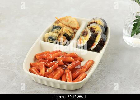 Korean Set Street Food Snack Bar Menu, Tteokbokki, Gimmari, and Gimbap Stock Photo