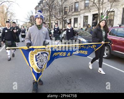 High School Pipes and Drums band marching in St.Patrick's Day Parade in Park Slope, Brooklyn, NY Stock Photo