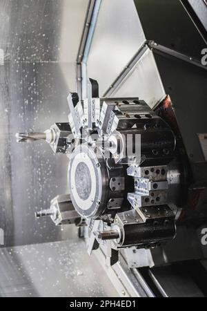 Drum with replaceable cutters inside the CNC machine Stock Photo