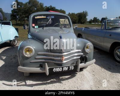 Le Bourget du lac, France - August 19th 2012 : Public exhibition of classic cars. Focus on a green Renault 4CV. Stock Photo