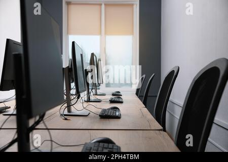 Many modern computers in open space office Stock Photo