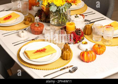 Autumn brunch table in the backyard with pumpkin and yellow decor Stock  Photo - Alamy