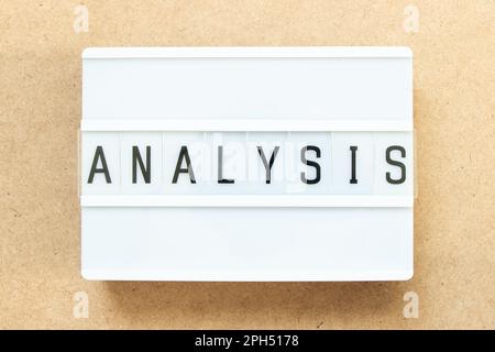 Lightbox with word analysis on wood background Stock Photo