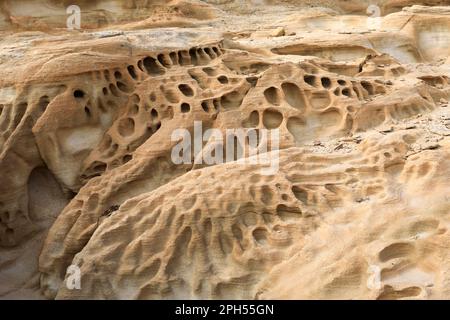 Sandstone patens in Wadi Musa, South Central Jordan, Middle East Stock Photo