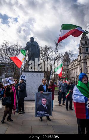 Iranian  pro-democracy protest against the autocratic Islamist government of Iran at Parliament Square in front of Churchill's statue, London, England Stock Photo