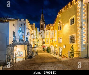 The colorful Bressanone old town during Christmas time in the evening, Trentino Alto Adige, northern Italy. Stock Photo