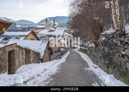 Brunico old town covered in snow during winter. Trentino Alto Adige, Italy. Stock Photo