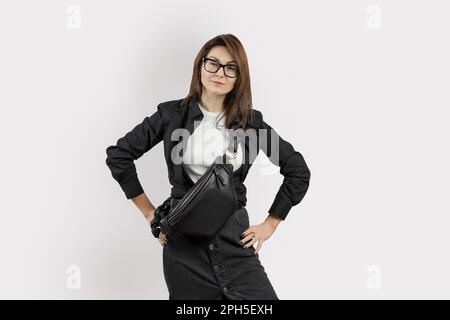 Elegant White Woman with Black Genuine Leather Waist Bag with Beautful Braided Strap Wearing Cross Body Stock Photo
