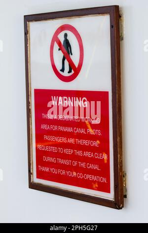 Access warning for passengers on the Cunard liner Queen Elizabeth when transiting the Panama Canal.  Working area for the canal pilots. Stock Photo