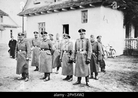 Bełżec extermination camp SS staff, 1942. from right to left: Heinrich Barbl, Artur Dachsel, Lorenz Hackenholt, Ernst Zierke, Karl Gringers, (unknown), Reinhold Feiks, Karl Alfred Schluch, and Friedrich Tauscher (front left). Belzec was an extermination centre built to murder the Jews of Lublin and Lwow. About 450,000 people were killed there before it was closed and eradicated in 1943. Very few photos of it exist as its operation was secret and it closed before the allies came so there are no post liberation images such as we see from Dachau and Auschwitz. Only 7 people survived Belzec. Stock Photo